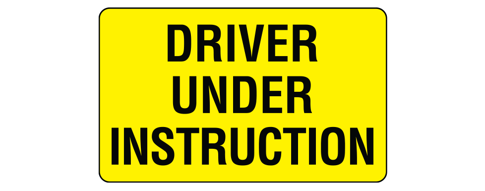 Driver Under Instruction Sign